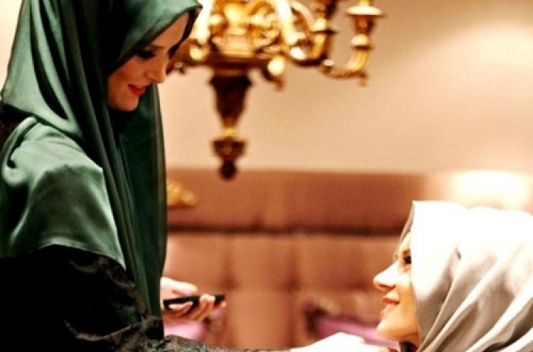 Turkish beauty mag ties Muslim veil to glamour
