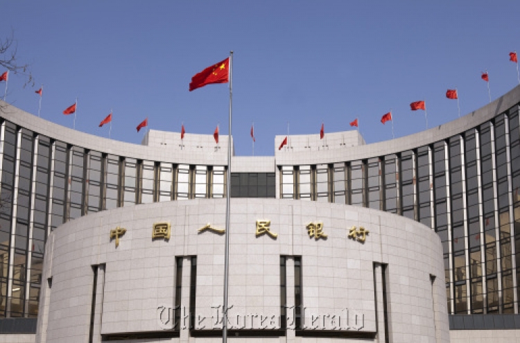 China says to cut bank reserves