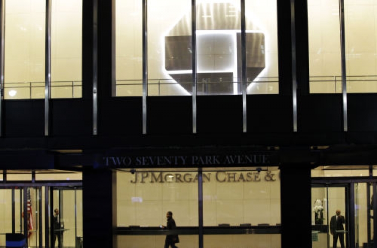 Fitch cuts JPMorgan’s rating