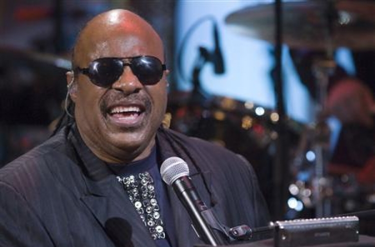 Two charged with trying to extort Stevie Wonder