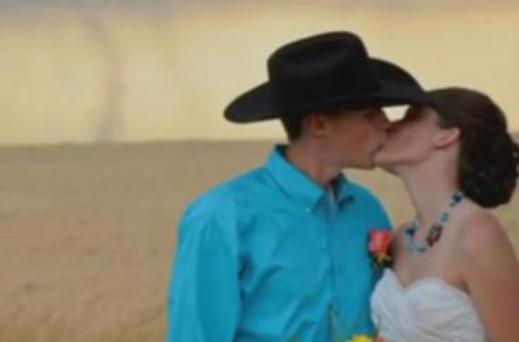 Tornado doesn't stop Kansas couple's wedding day