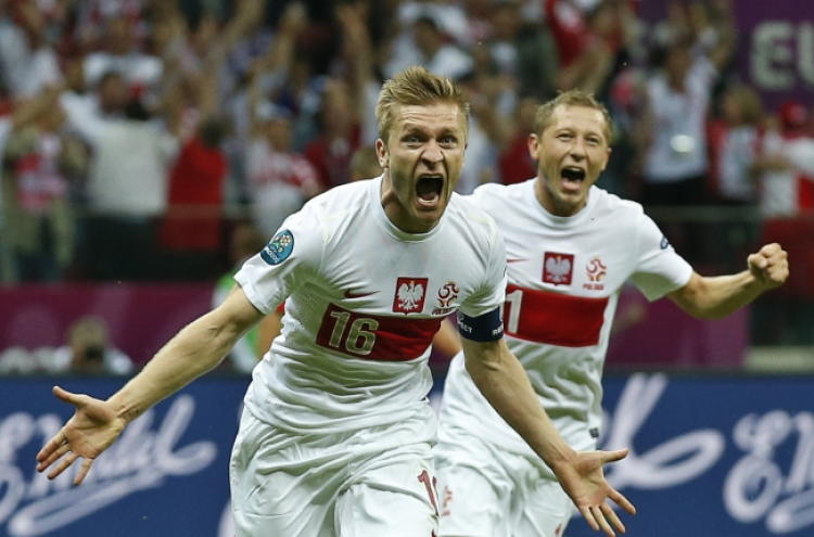 Russia, Poland play out 1-1 draw