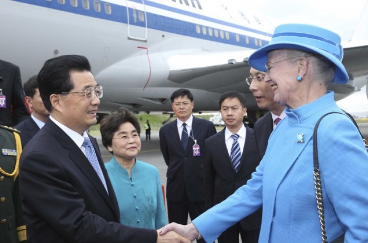 Hu arrives in Denmark for landmark visit