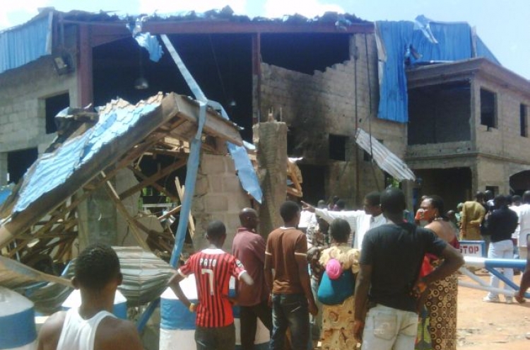 At least 36 dead after Nigeria church blasts, rioting