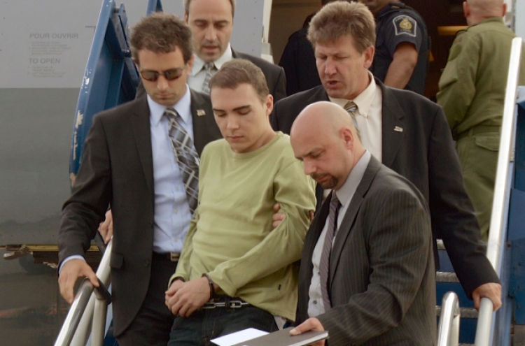 Suspect in body parts case returns to Canada