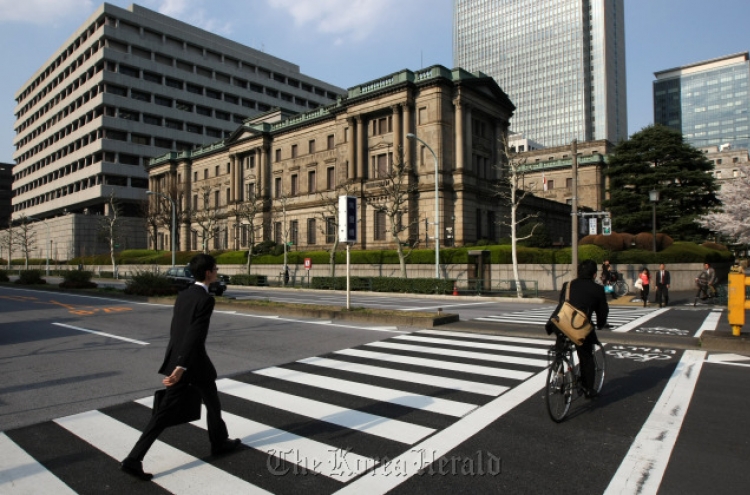 Japan current account surplus shrinks