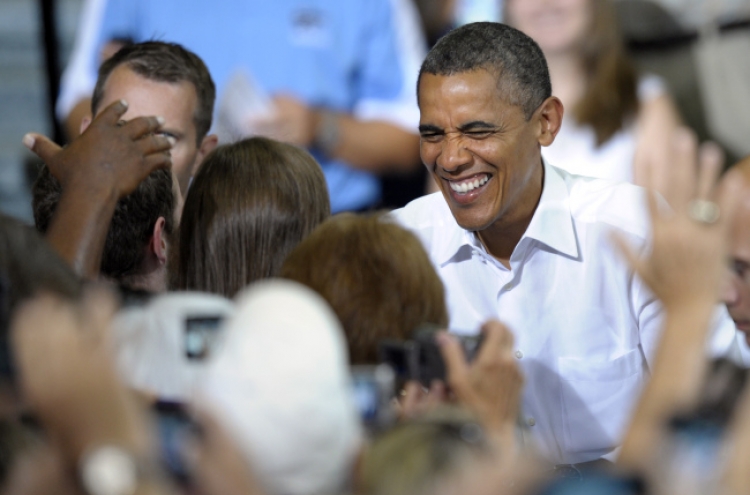 Obama goes negative with Romney attack ad