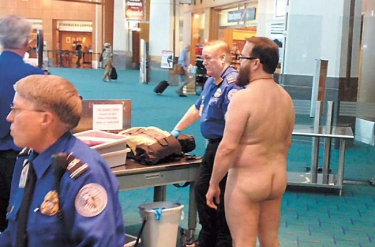 Judge: Man who stripped nude at airport not guilty