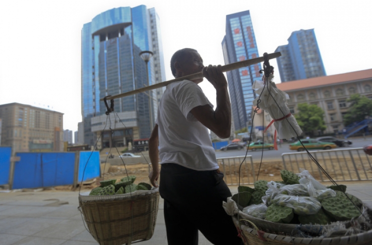 China Q3 growth may slow to 7.4%