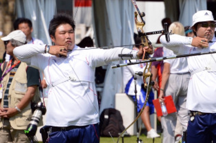 Archers begin chase for gold on opening day of London Olympics