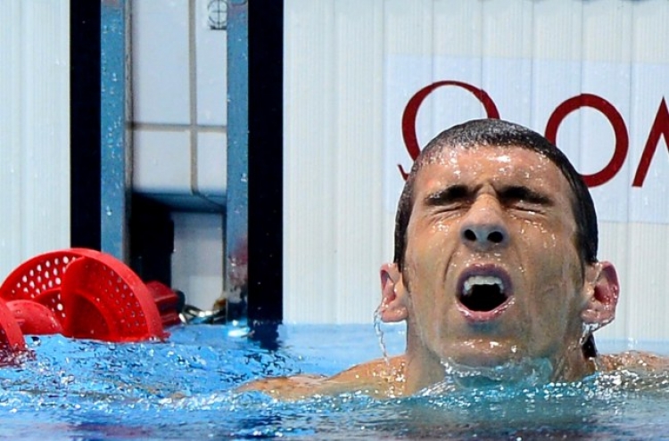 Michael Phelps aims for redemption in 200 fly