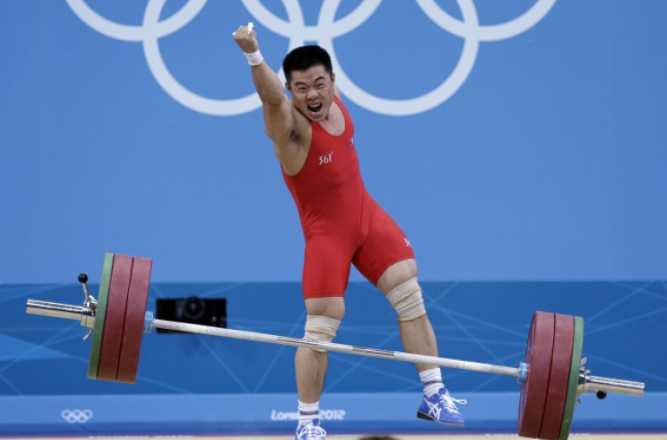 North Korean Kim wins men's -62kg weightlifting