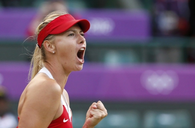 Sharapova sinks Clijsters to book all-Russian semi