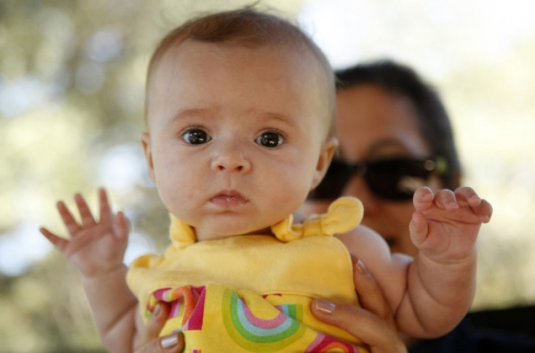 Woman spots her child for sale on Internet