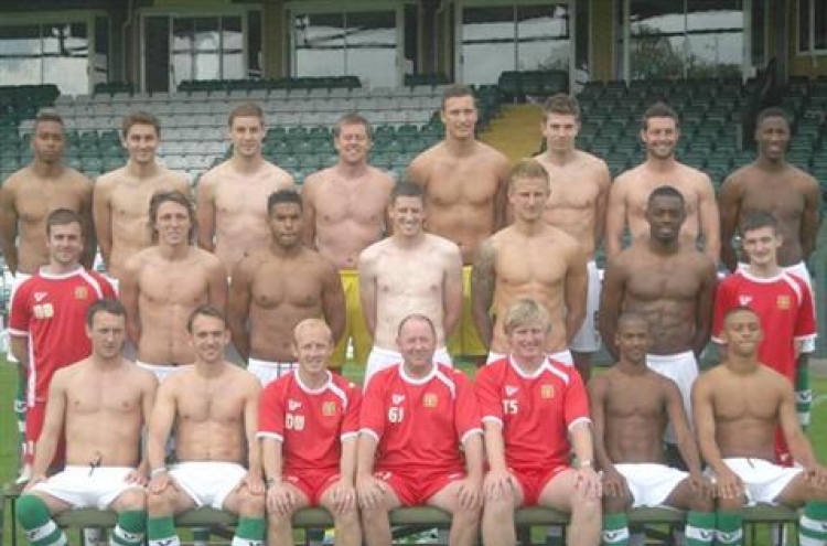 Soccer players strip off for sponsors