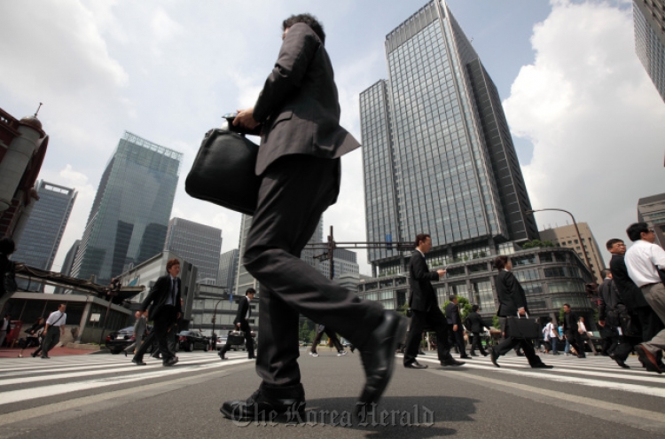 Japan growth may slow to half previous pace