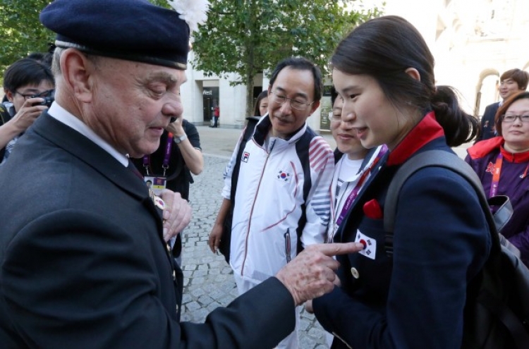 Olympians pay tribute to veterans of Korean War