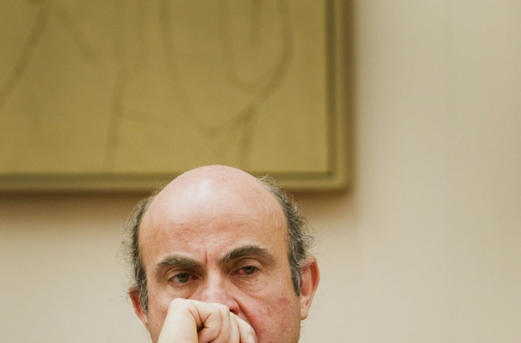 De Guindos says bailout fund to manage Spain bank restructuring