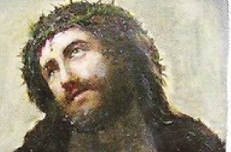 Ham-fisted amateur botches 'restoration' of Christ painting