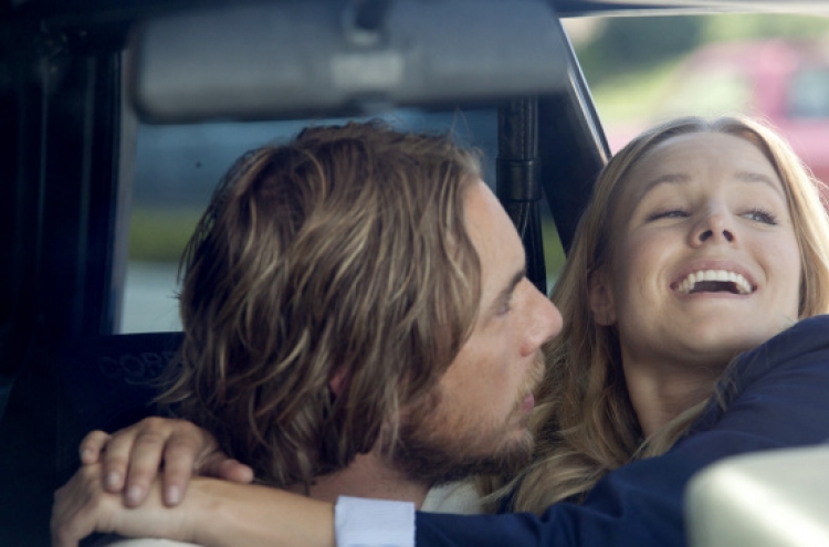 Dax drives and Kristen happily rides shotgun in ‘Hit and Run’