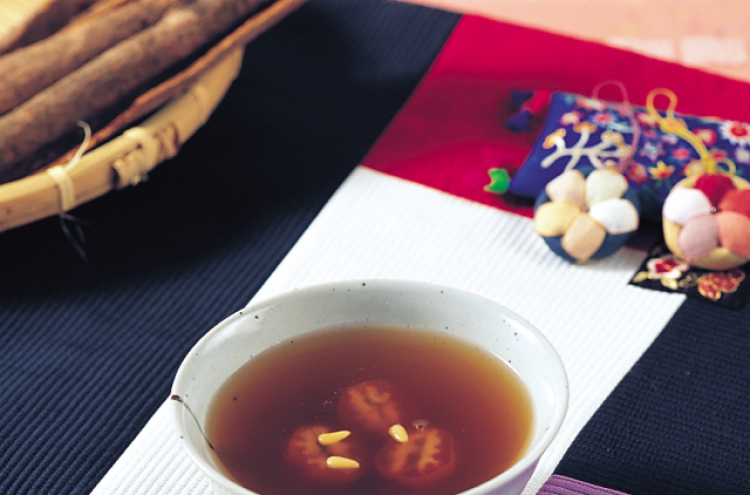 Sujeonggwa, (cinnamon punch with dried persimmons)