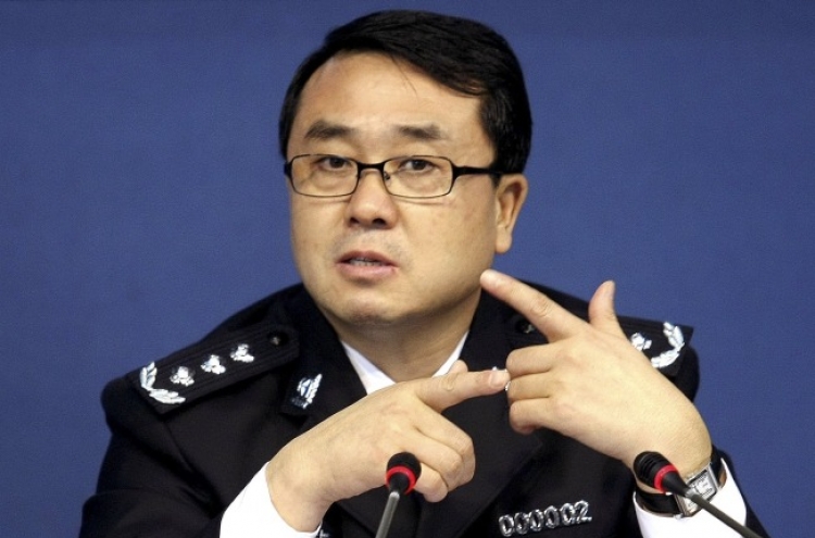 Ex-police chief charged in China political scandal