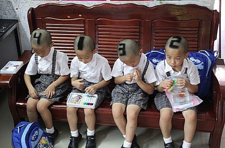 Mom shaves quadruplets’ heads to tell them apart