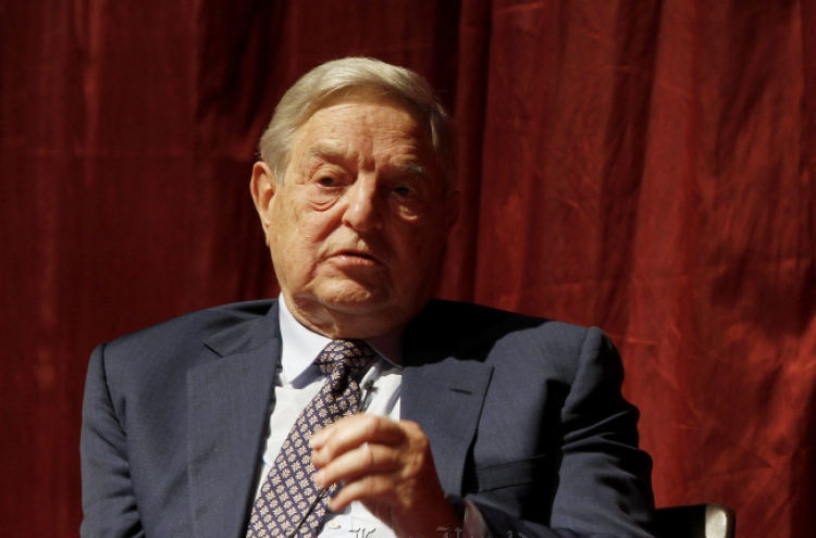 Germany risks recession by enforcing euro austerity: Soros