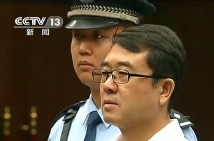 China ex-police chief gets 15 years in jail