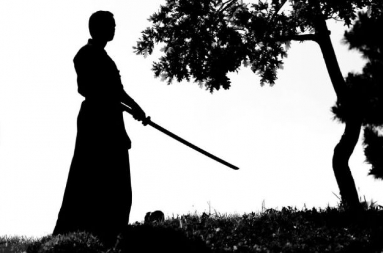 Swimming the hard way in Japan: in samurai armor