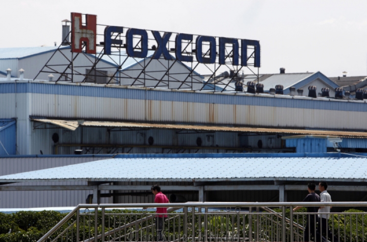 Foxconn workers return to iPhone production after stoppage