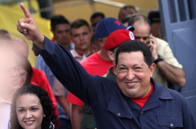 Chavez wins six more years in close race