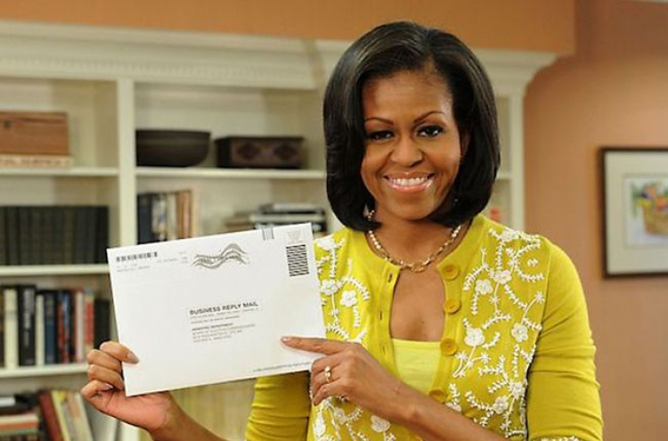 From Michelle with love, first lady casts vote