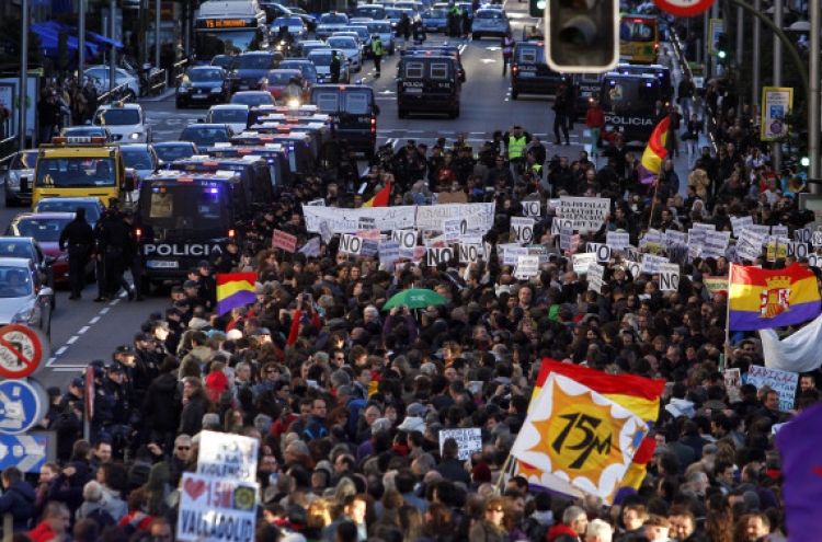 Thousands join new Spain protest