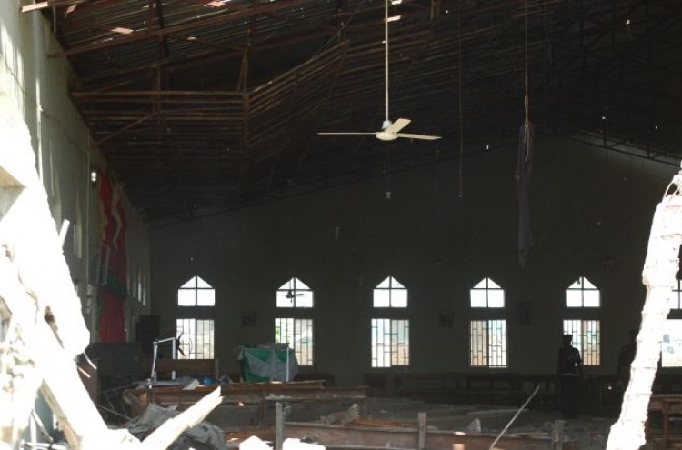 At least 10 dead as Nigeria church bombing sparks revenge attacks