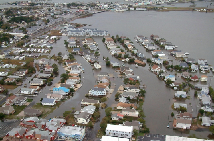 Sandy's death toll climbs; millions without power