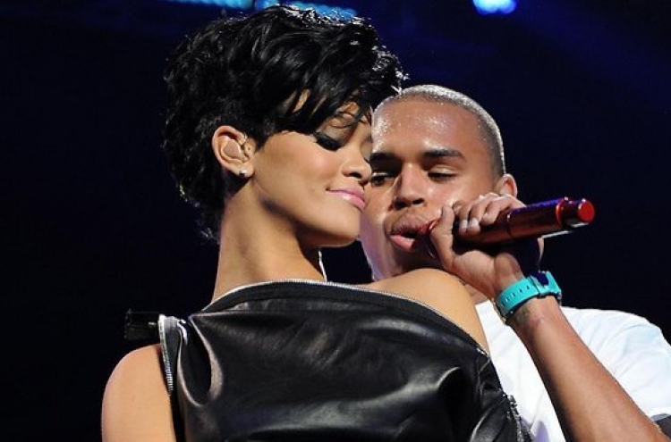 Chris Brown denies he is dating Rihanna