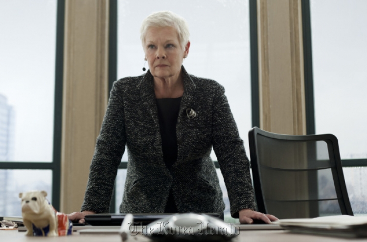 As mom to Bond, Dench reflects on her 007 reign