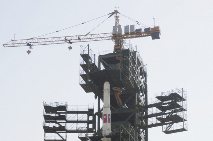 N.K. erecting last stage of rocket