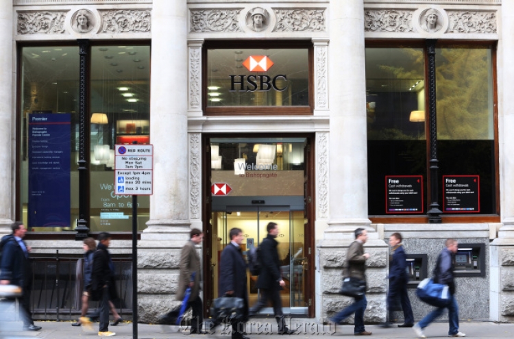 Fitch lowers HSBC rating