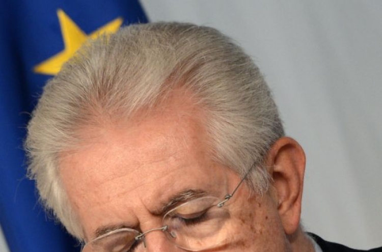 Italy’s Monti seeks to calm market concerns