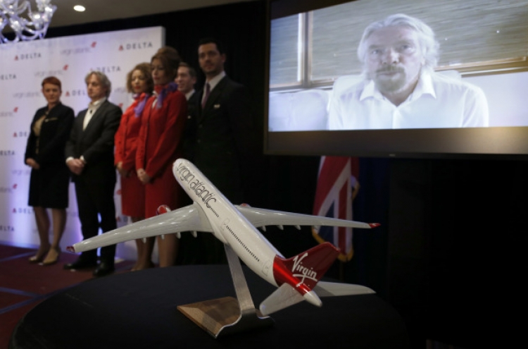 Delta buys 49% stake in Virgin tlantic