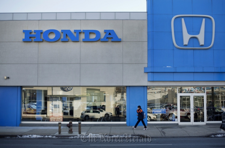 Honda recalls 871,000 cars on roll away defect