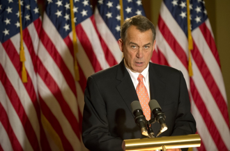 Obama, Boehner clash over fiscal cliff