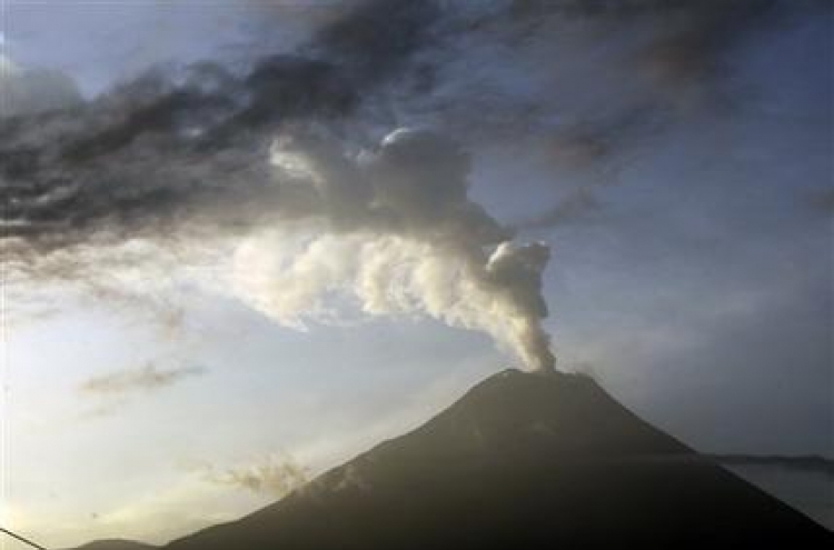 Ecuador volcano blasts more hot rock from crater