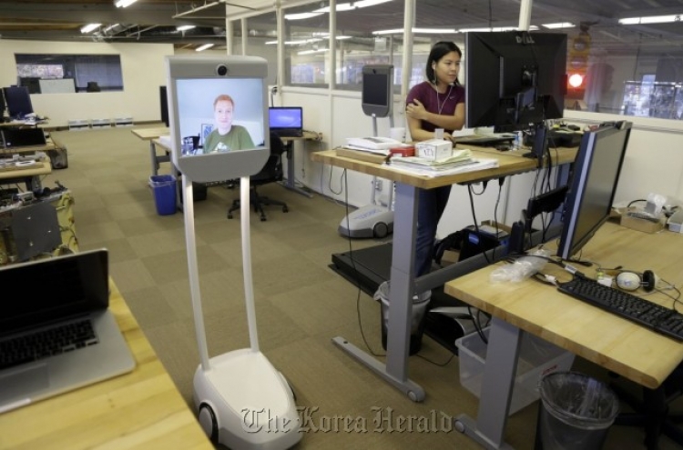 Telepresence robots allow employees to ‘beam’ into work