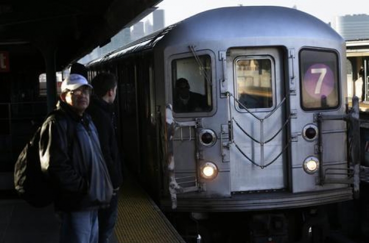 Woman charged with murder in NY subway shove death