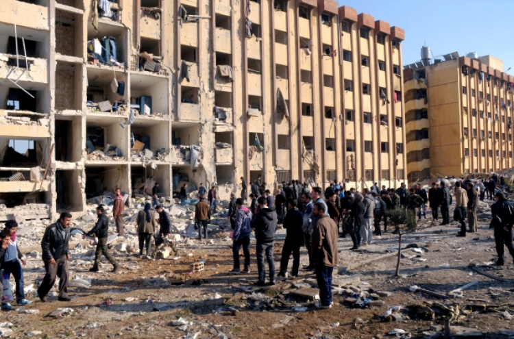 Dozens killed in Syrian university blasts