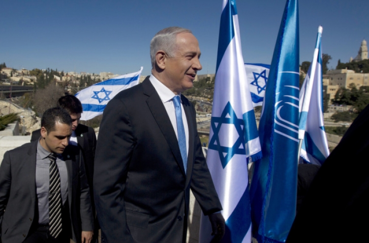 As Israelis vote, peace seems distant