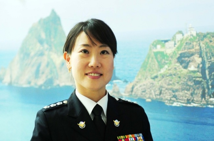 Ko first female captain of 60-year-old Coast Guard